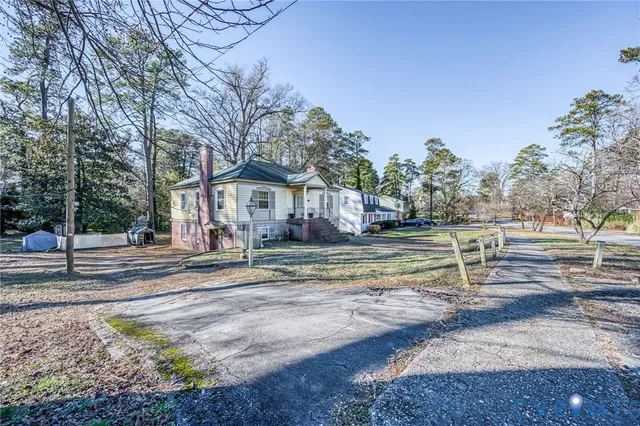 a view of a house with garden