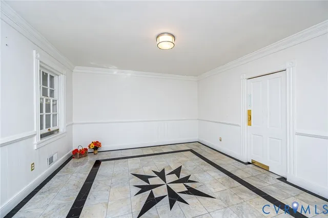 a view of a room with equipment and a window