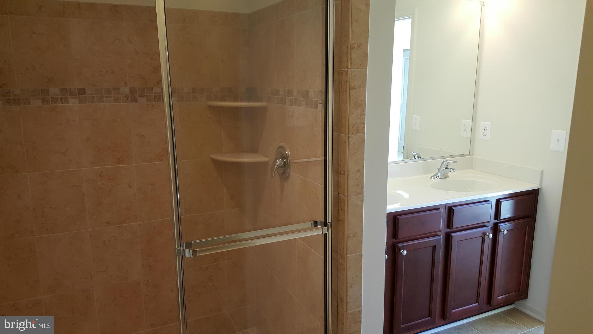 2043 Spring Run Circle Frederick, MD 21702 - Photo 10 of 18 Master Bath w/upgraded ceramic tile walls & floors