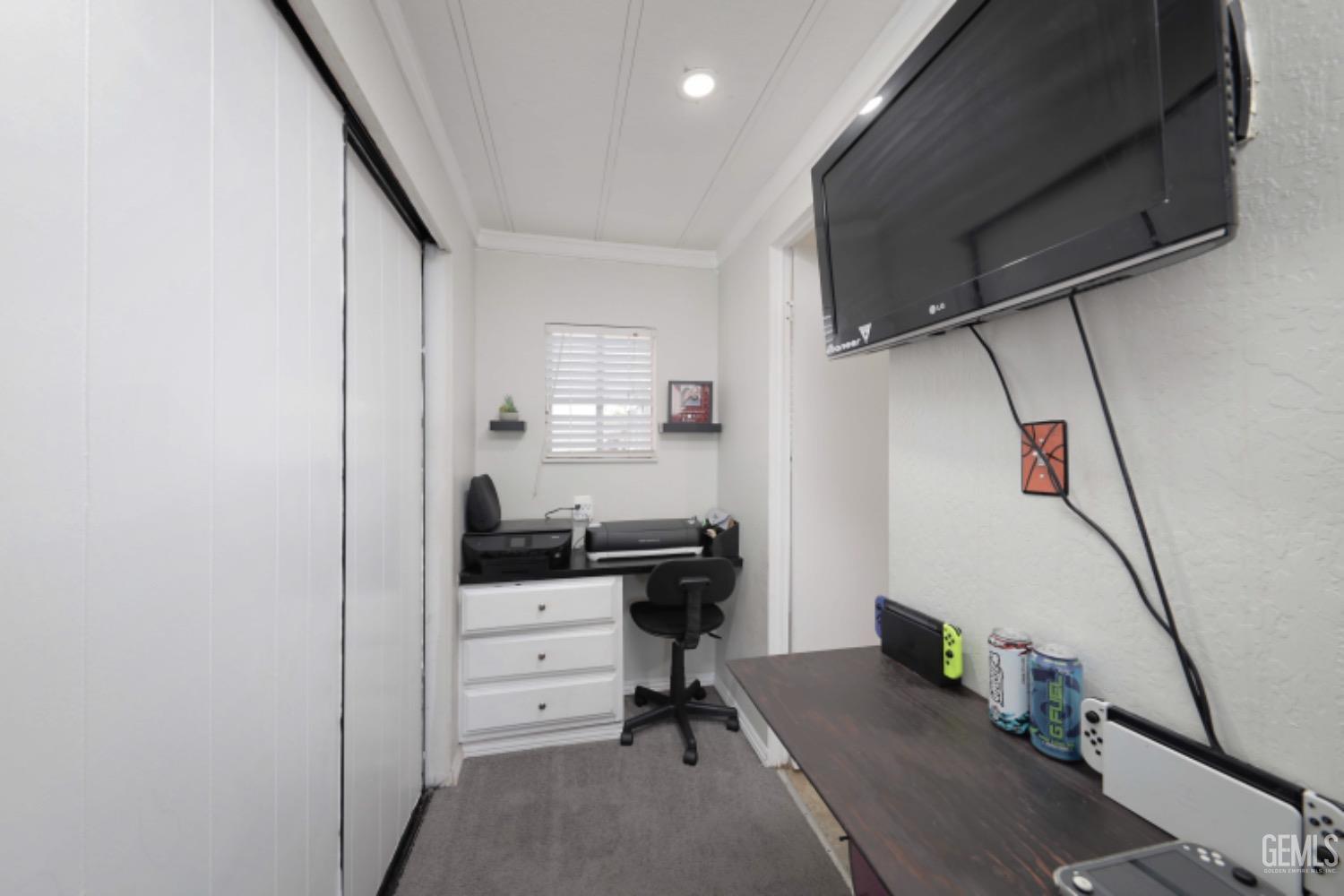 Undisclosed Address Bakersfield, CA 93306 - Photo 15 of 35 a view of a workspace with furniture