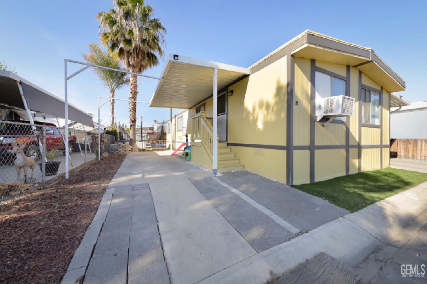 Undisclosed Address Bakersfield, CA 93306 - Photo 20 of 35 a view of a house with backyard