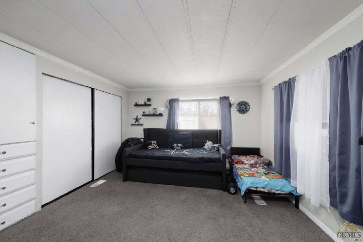 Undisclosed Address Bakersfield, CA 93306 - Photo 29 of 35 a bedroom with bed and window