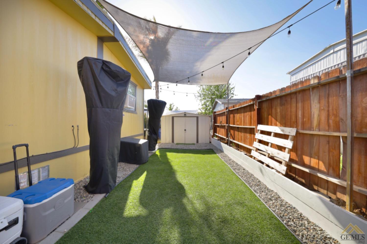 Undisclosed Address Bakersfield, CA 93306 - Photo 32 of 35 a view of a porch with furniture and a yard
