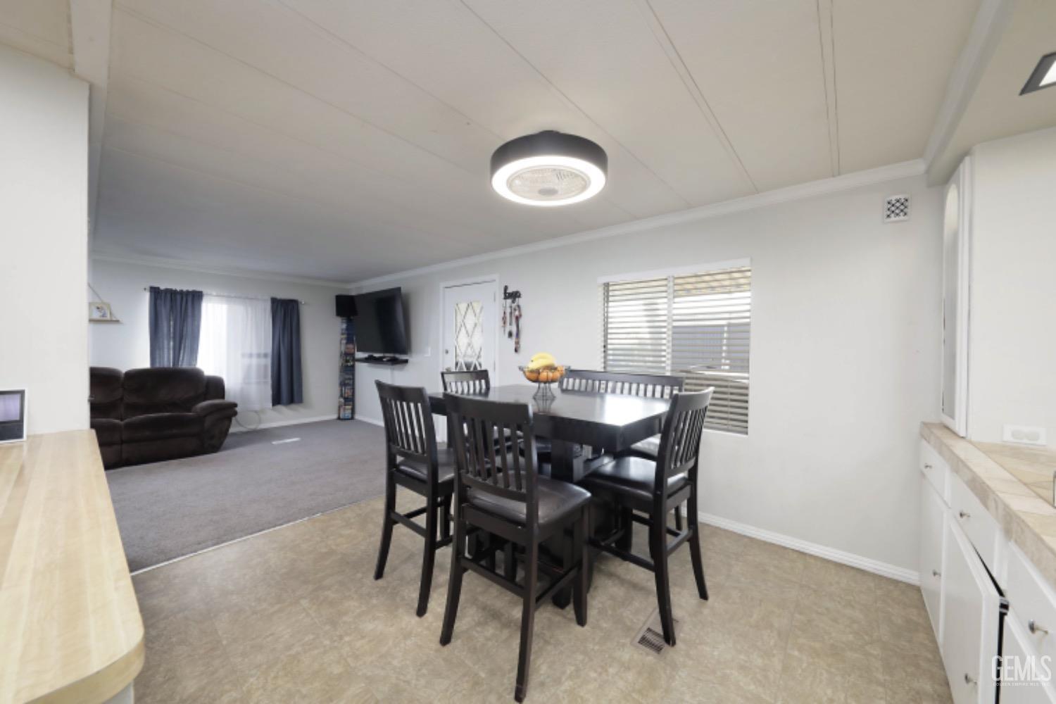 Undisclosed Address Bakersfield, CA 93306 - Photo 8 of 35 a view of a dining room with furniture