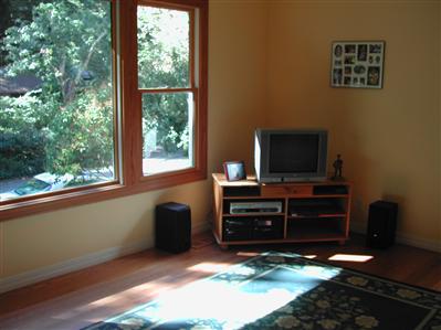 98 Bothin Road Fairfax, CA 94930 - Photo 5 of 6 a living room with furniture and a flat screen tv