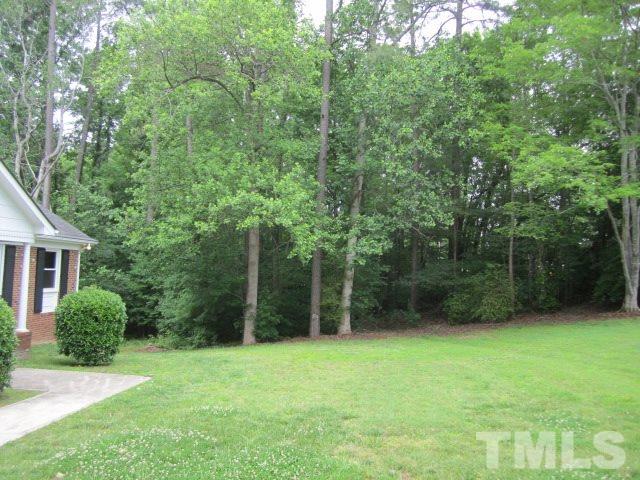 9505 Fonville Road Raleigh, NC 27614 - Photo 6 of 7 a view of a backyard with a trees