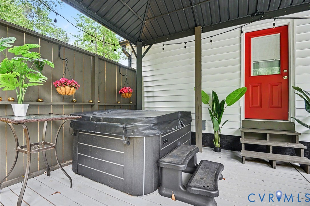 9820 Beaver Bridge Road Chesterfield, VA 23838 - Photo 43 of 54 Private deck featuring a hot tub, a red entry door