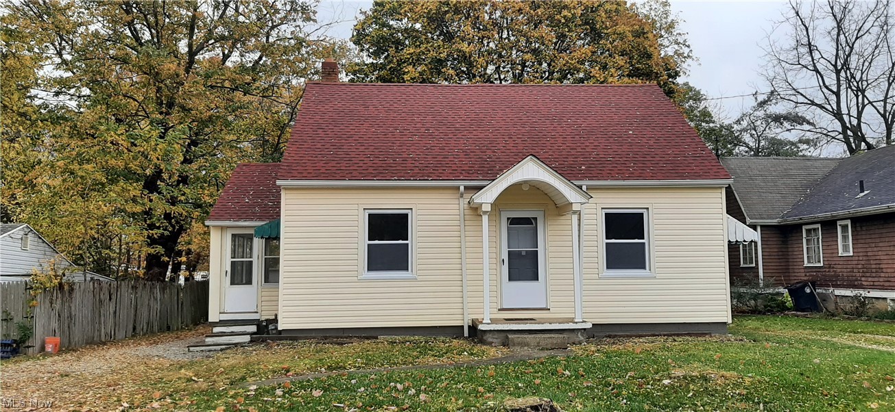 1295 Brittain Road Akron, OH 44310 - Photo 1 of 18 View of front facade featuring a front lawn