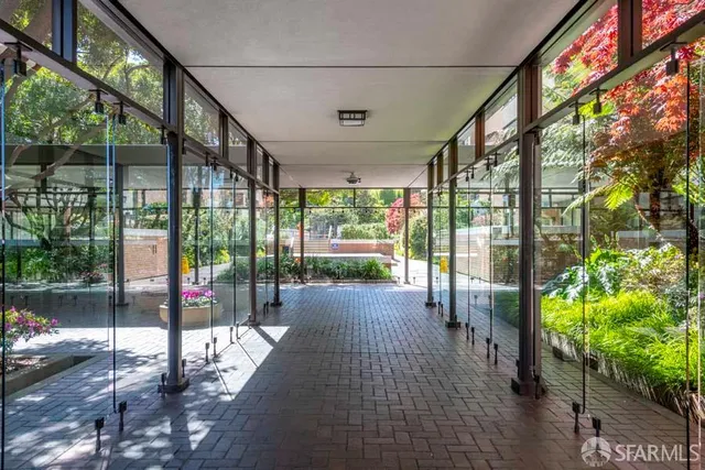 a view of a floor with couch in front of it