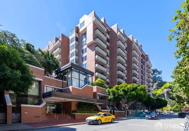a car parked in front of a building