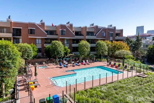 a view of a building with sitting area