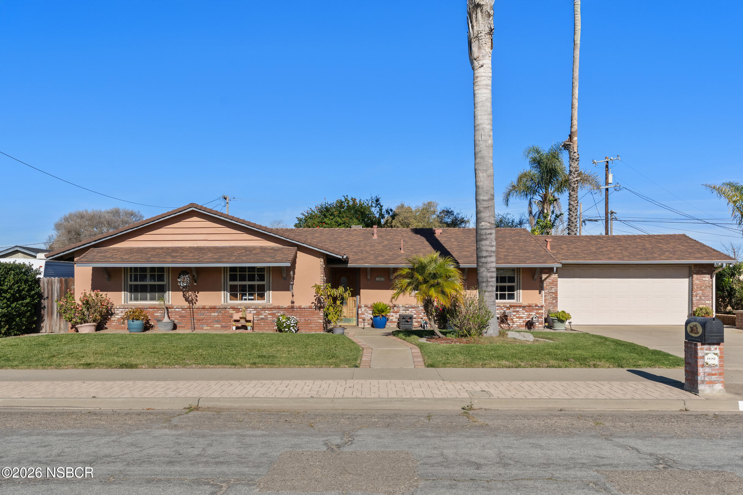 a front view of a house with a porch