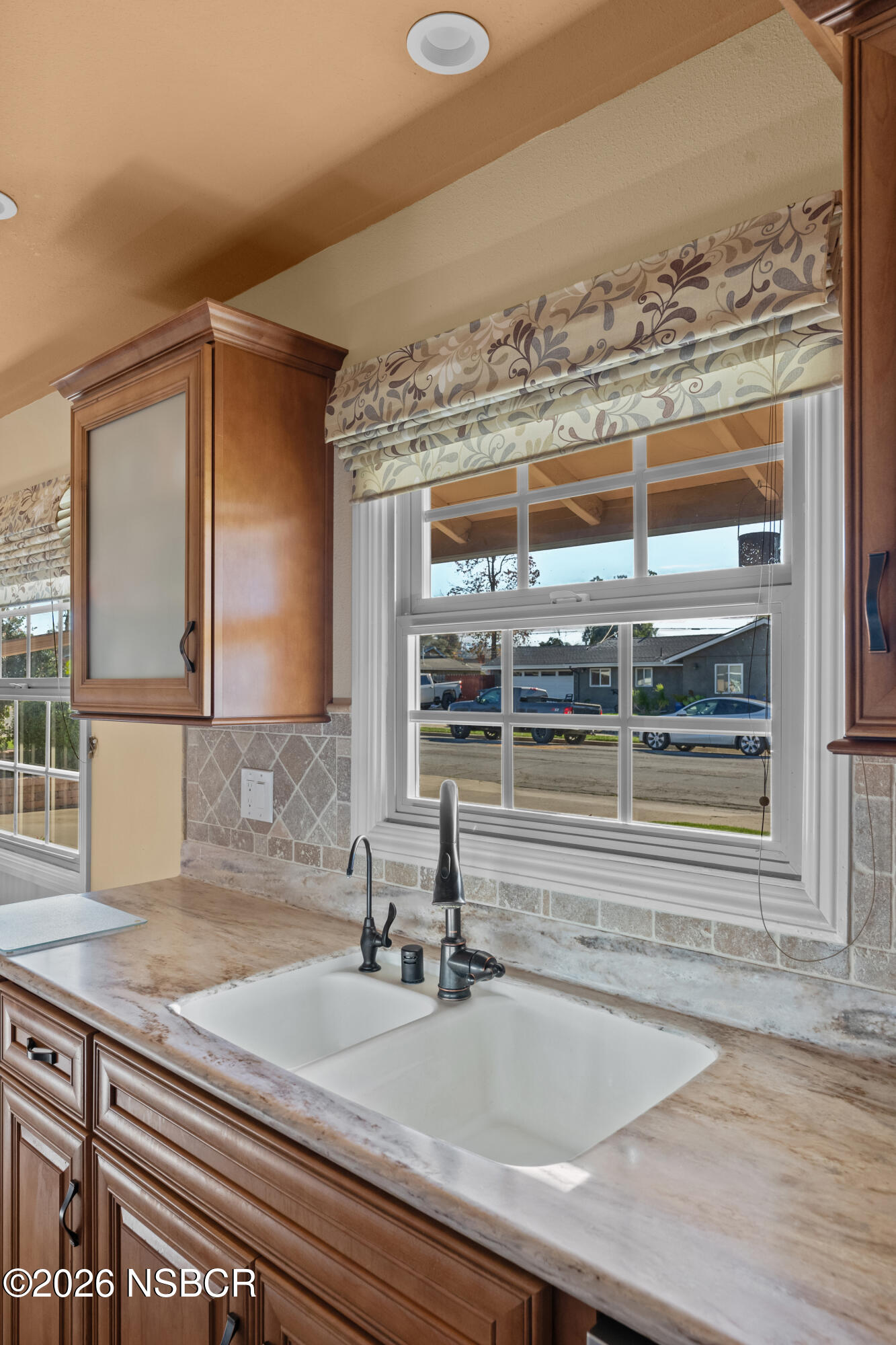 1157 Glines Avenue Santa Maria, CA 93455 - Photo 17 of 41 a bathroom with a granite countertop sink and a window