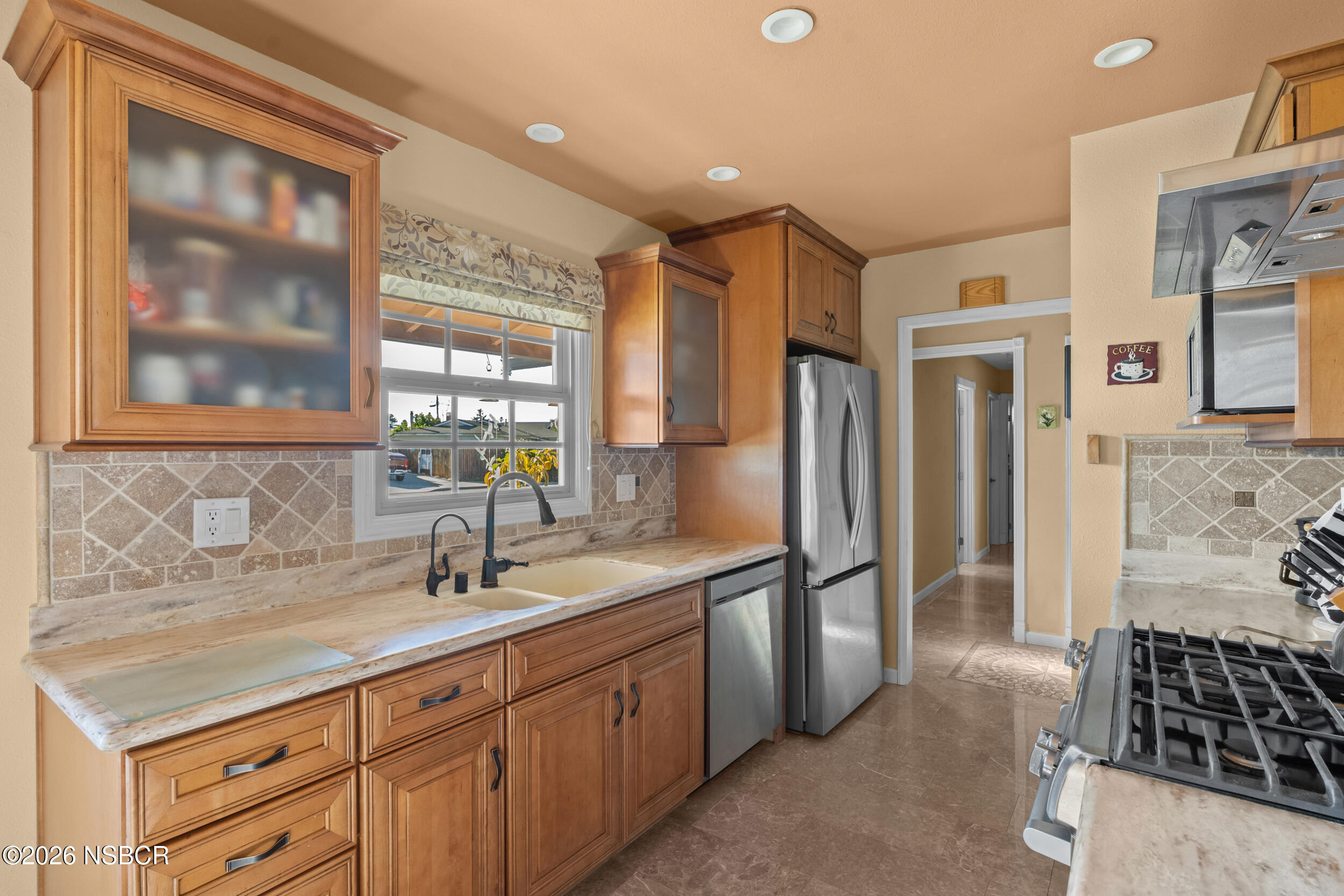 1157 Glines Avenue Santa Maria, CA 93455 - Photo 18 of 41 a spacious bathroom with a double vanity sink a large mirror and a shower