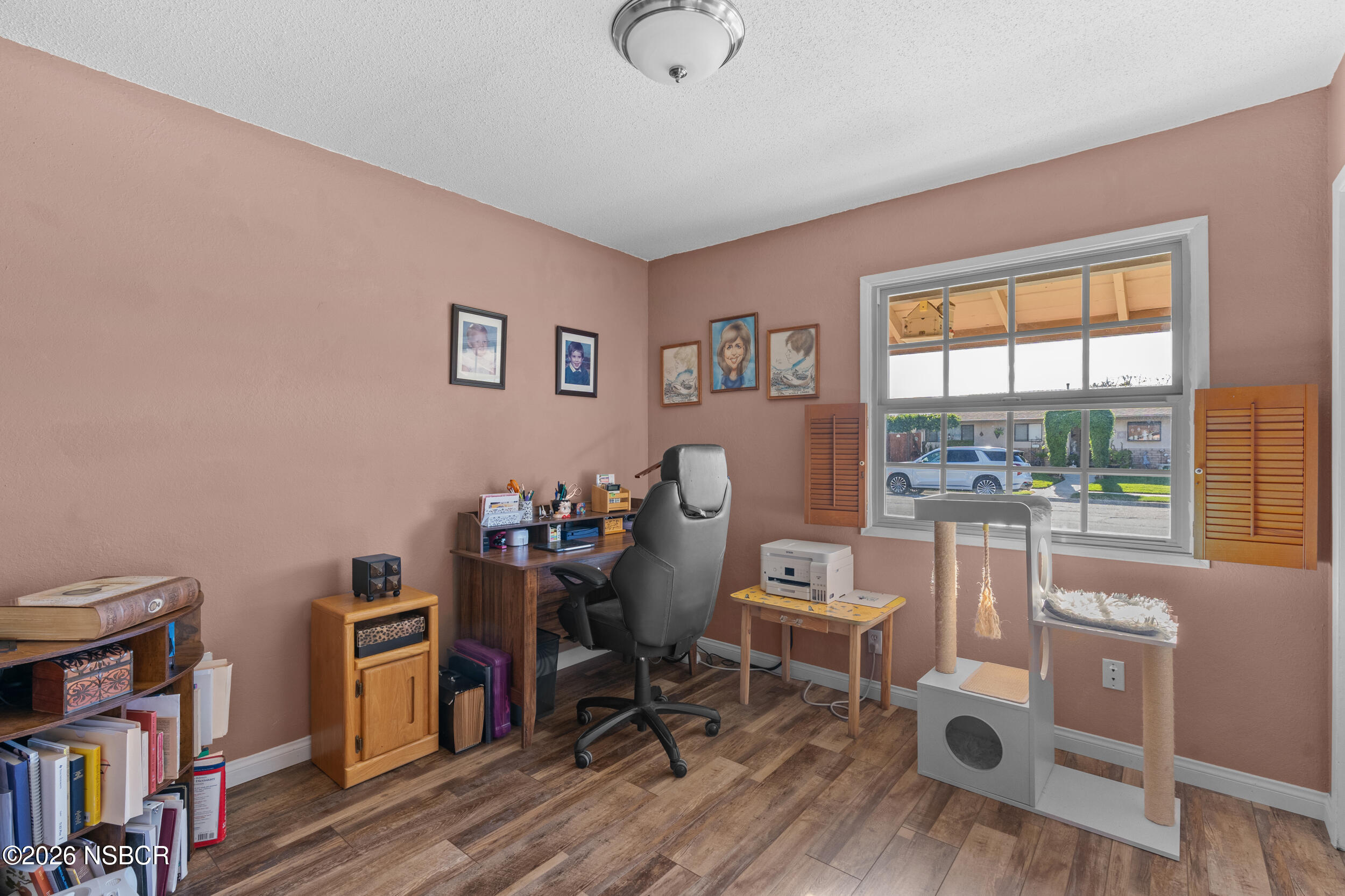 1157 Glines Avenue Santa Maria, CA 93455 - Photo 21 of 41 a view of a workspace with furniture and a window