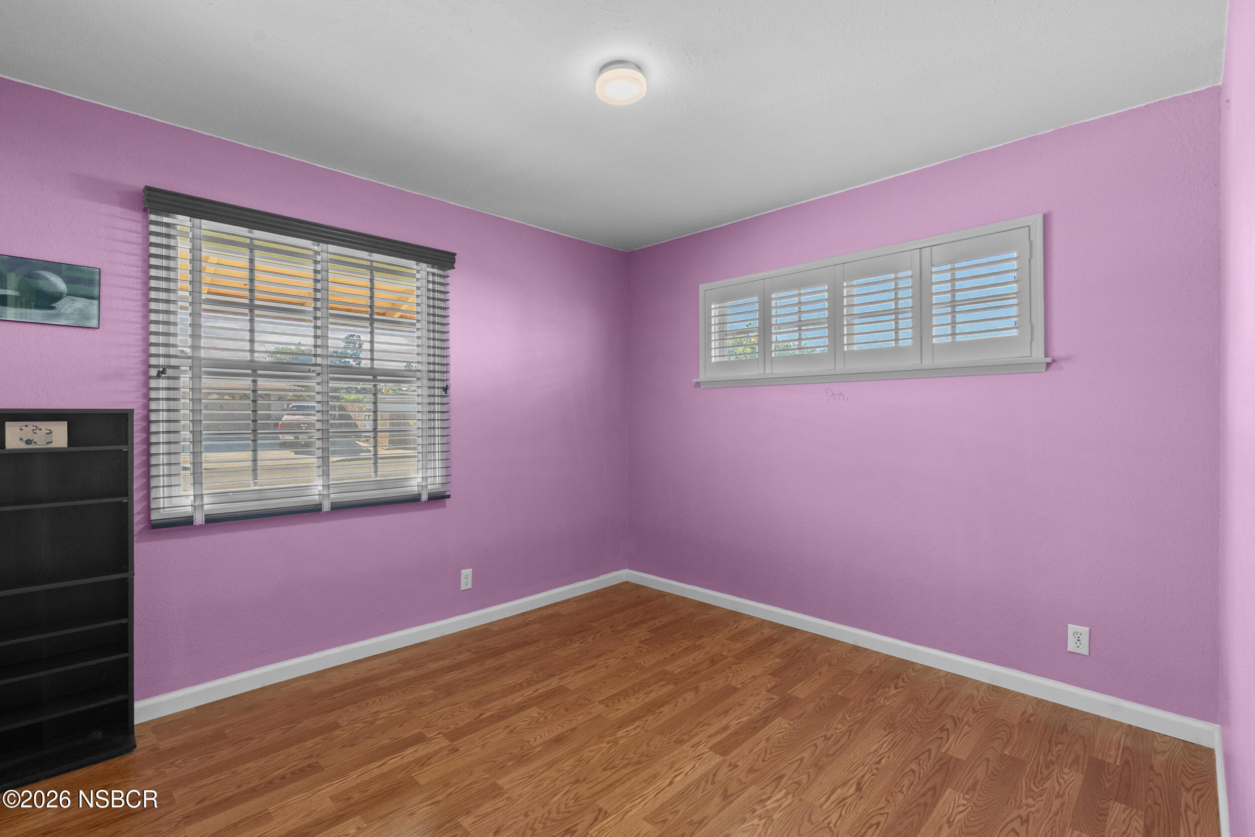 1157 Glines Avenue Santa Maria, CA 93455 - Photo 22 of 41 a view of an empty room with a window