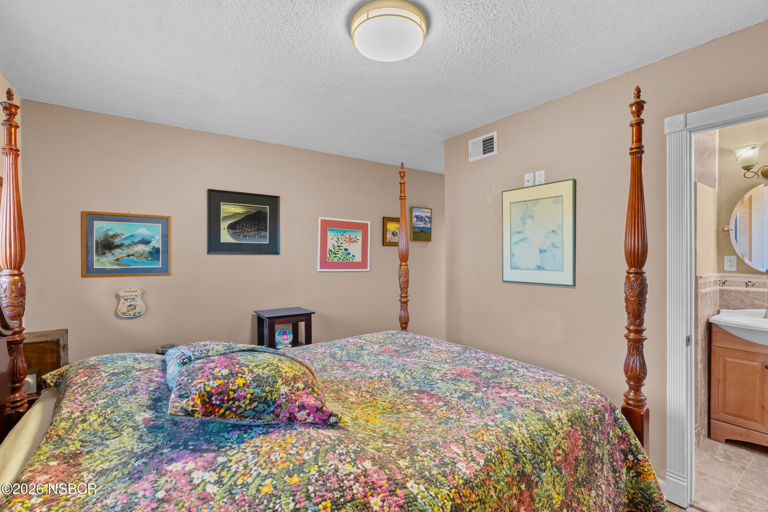 1157 Glines Avenue Santa Maria, CA 93455 - Photo 28 of 41 a bedroom that has a bed and a dresser in it