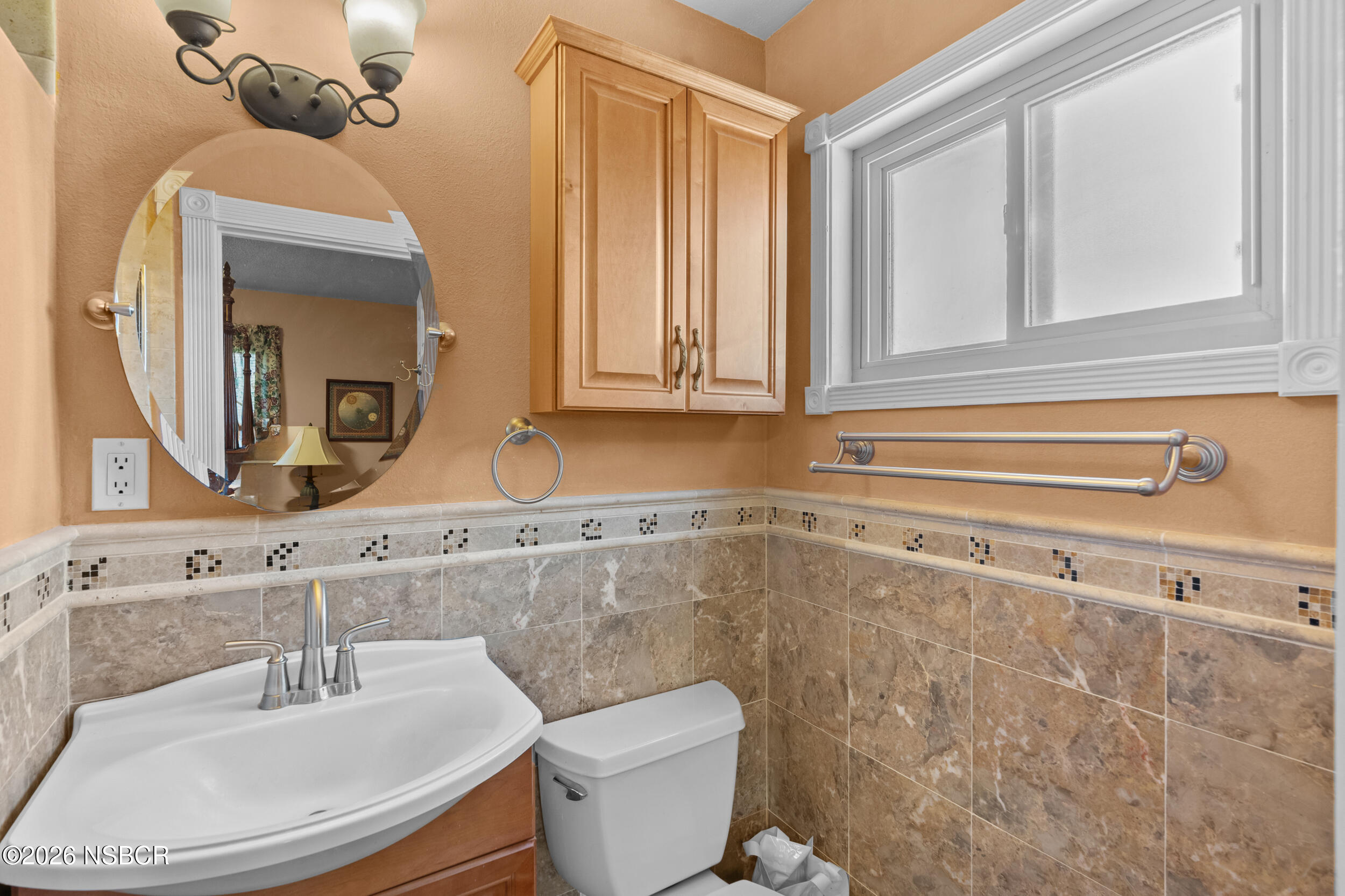 1157 Glines Avenue Santa Maria, CA 93455 - Photo 30 of 41 a bathroom with a sink and a mirror