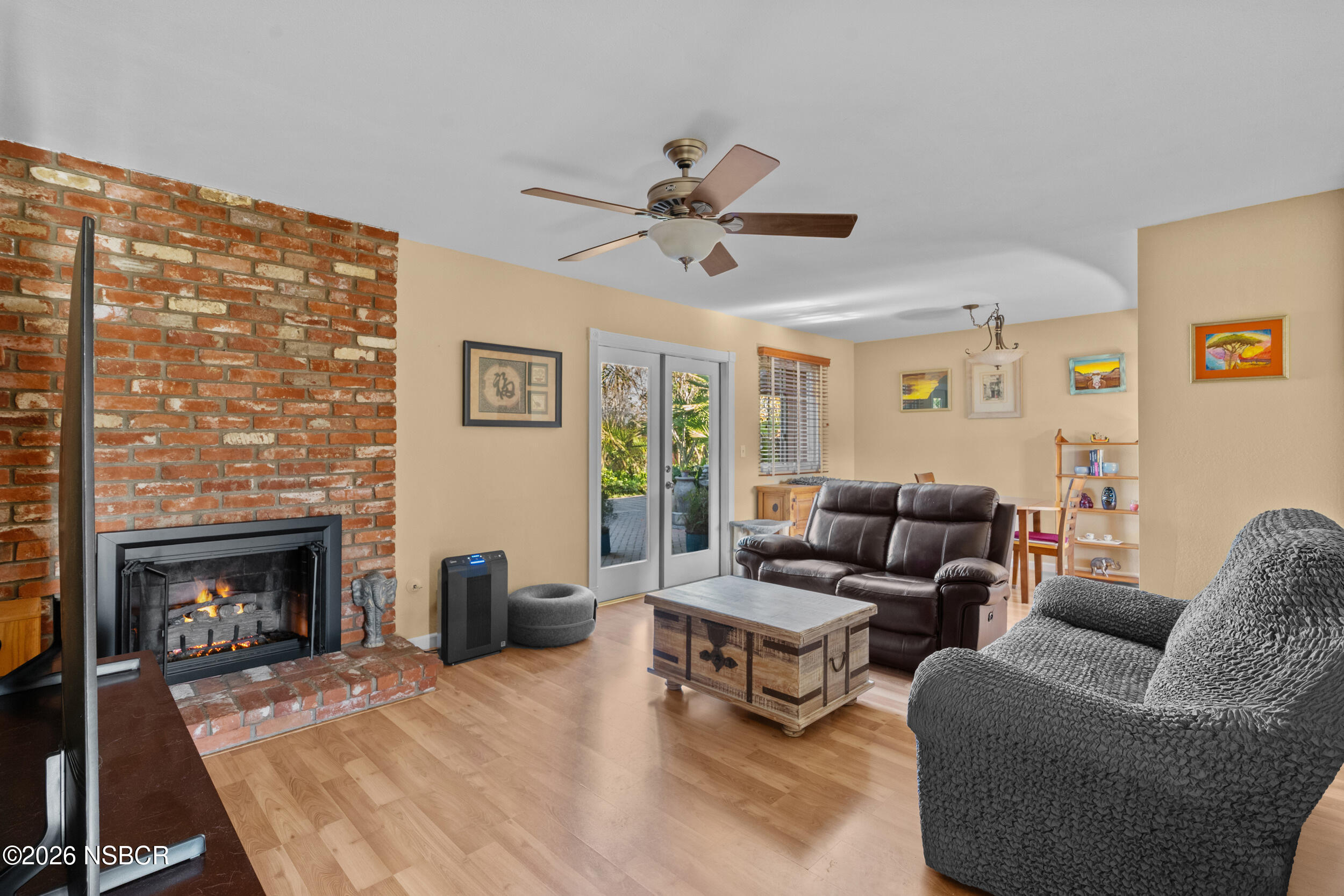 1157 Glines Avenue Santa Maria, CA 93455 - Photo 9 of 41 a living room with furniture and a fireplace