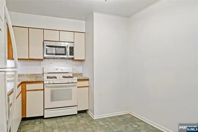 a view of a brick house with brick walls