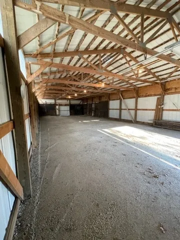 a view of a room with wooden walls