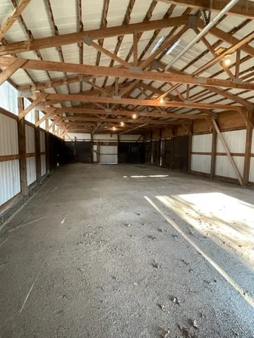 a view of a room with wooden walls