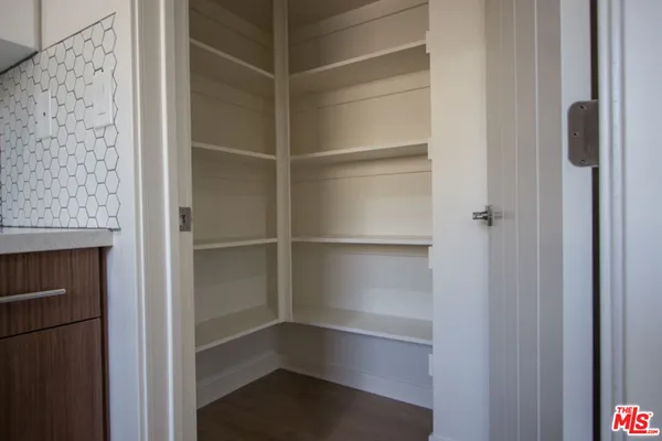 a empty closet with white paint