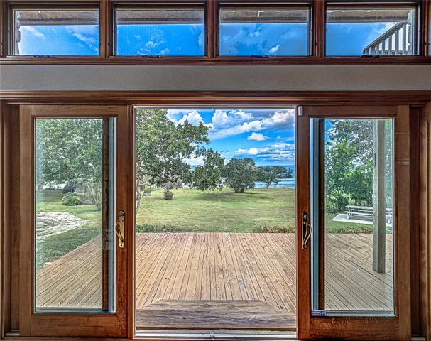 a view of a living room and front door