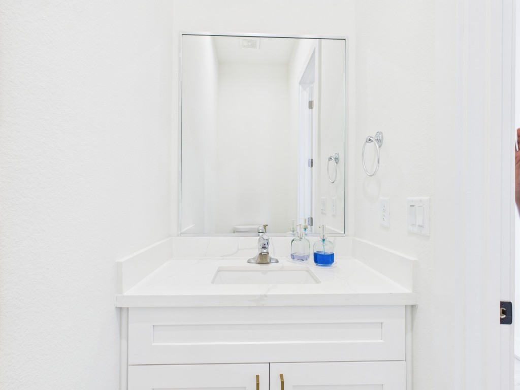 4306 Idaho Street Houston, TX 77021 - Photo 14 of 30 a bathroom with a sink and a mirror