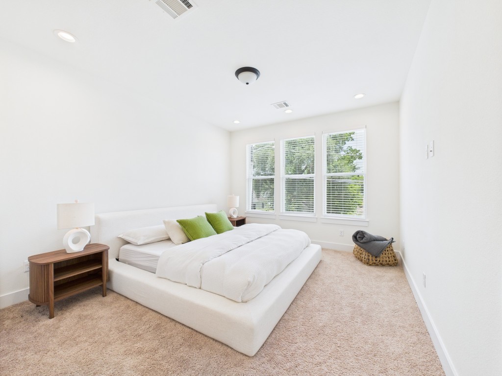 4306 Idaho Street Houston, TX 77021 - Photo 15 of 30 a bedroom with a bed and a window