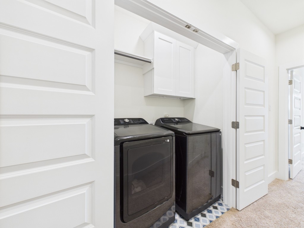 4306 Idaho Street Houston, TX 77021 - Photo 28 of 30 a view of storage and utility room with washer and dryer