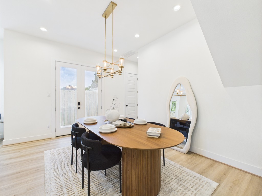 4306 Idaho Street Houston, TX 77021 - Photo 5 of 30 a view of a dining room with furniture and wooden floor