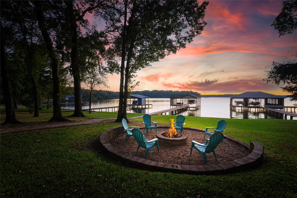 a view of a backyard with plants and patio