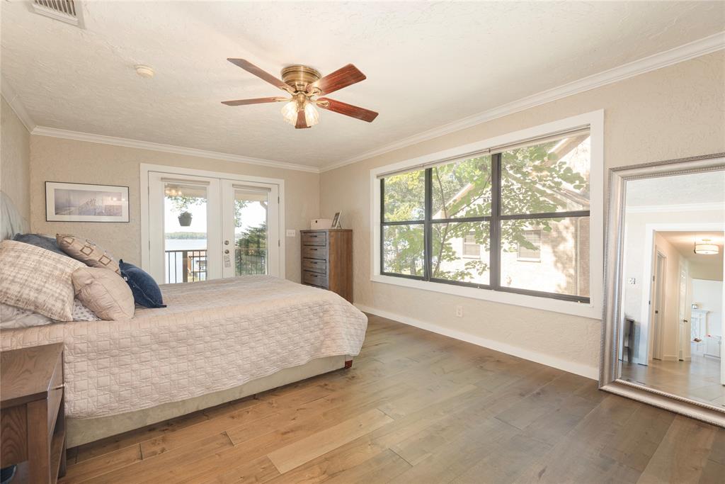 560 Private Road Edna, TX 77957 - Photo 23 of 40 Primary bedroom has porch access and amazing views.