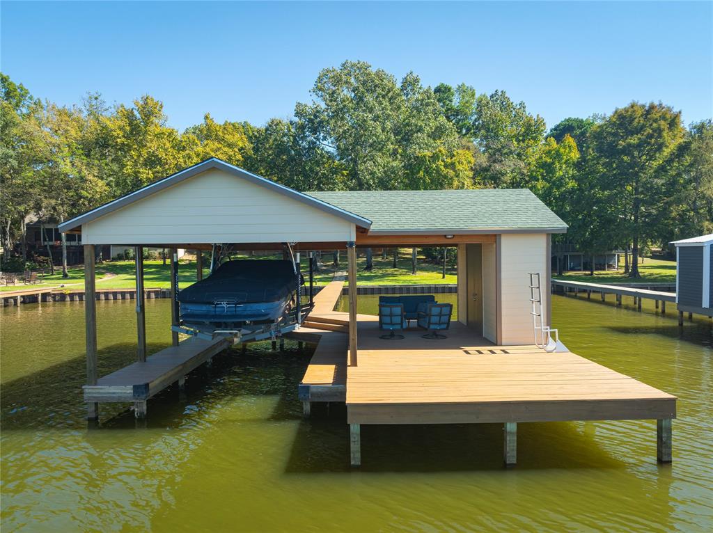 560 Private Road Edna, TX 77957 - Photo 36 of 40 Boathouse with bonus decking and covered area.