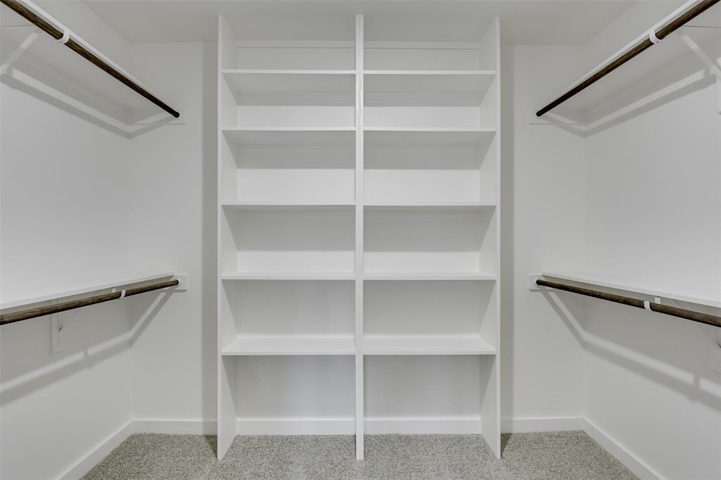 4042 Clovis Street Midlothian, TX 76065 - Photo 16 of 22 a view of walk in closet with empty racks