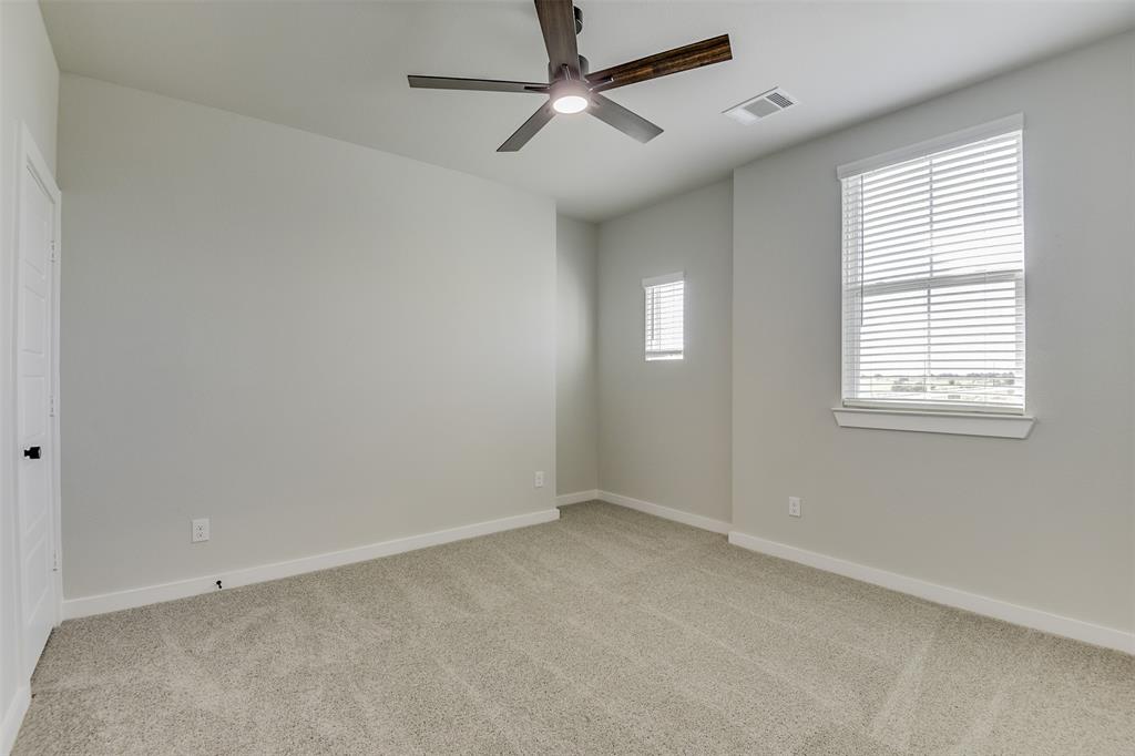 4042 Clovis Street Midlothian, TX 76065 - Photo 19 of 22 a view of an empty room with a window