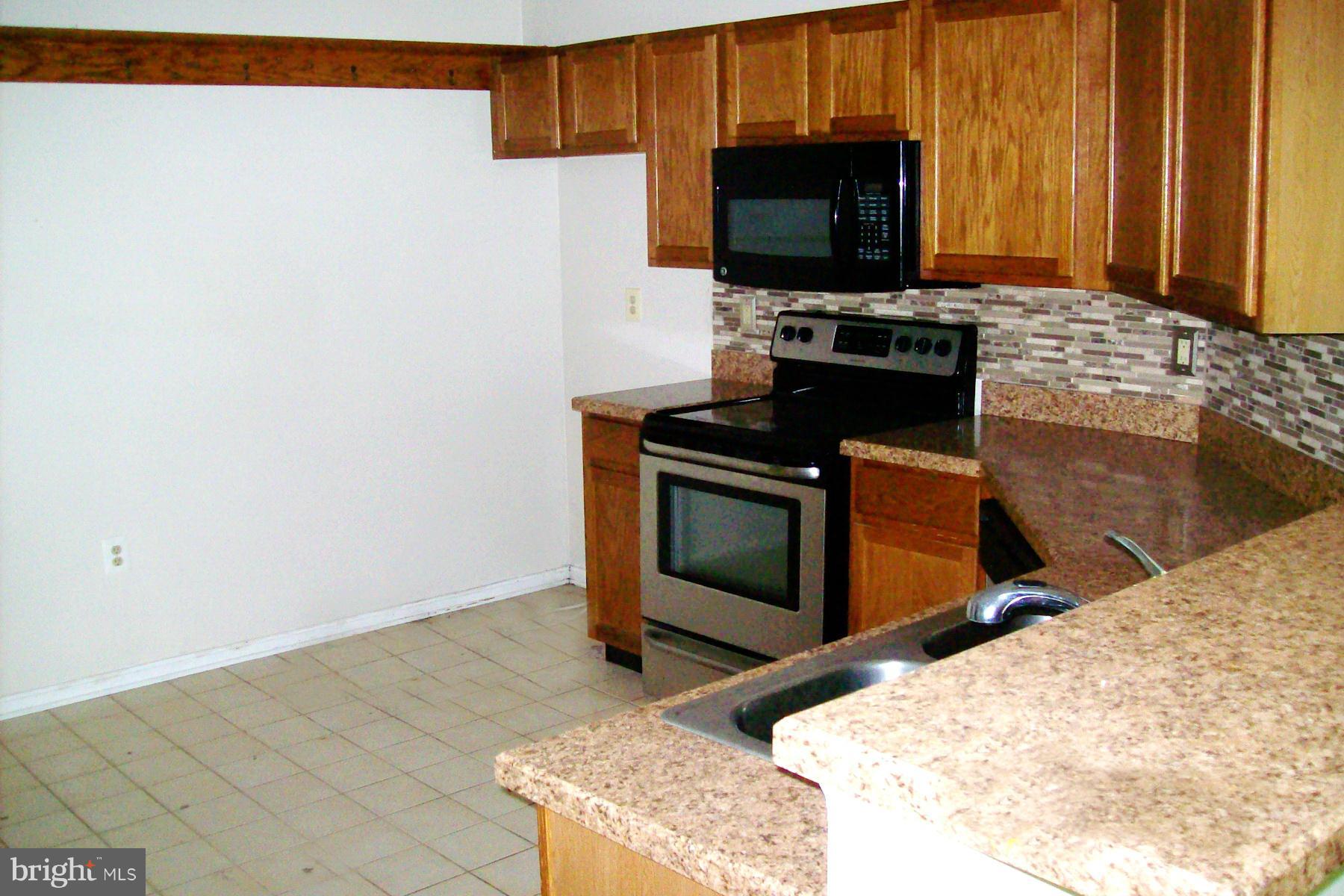 7208 Bogley Road, Unit 203 Baltimore, MD 21244 - Photo 4 of 19 Kitchen