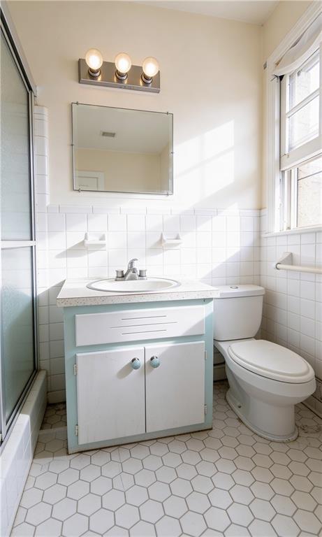 5195 Austell Road Austell, GA 30106 - Photo 28 of 34 a bathroom with a sink toilet and mirror