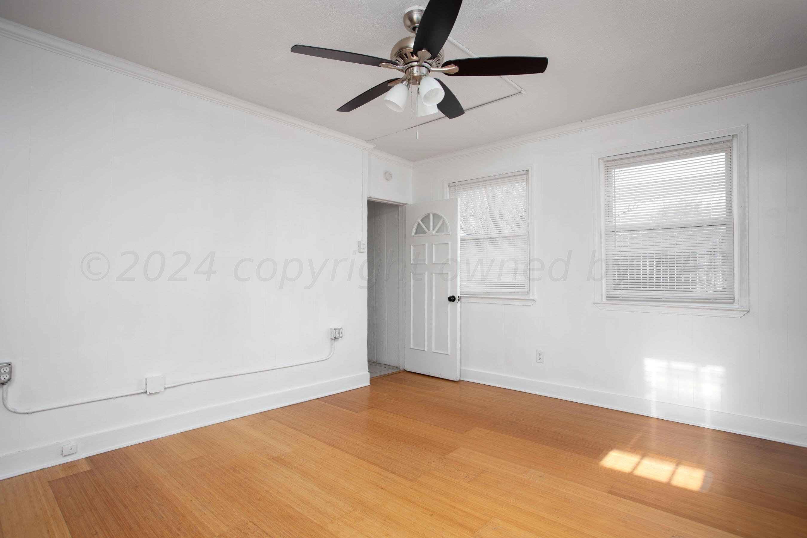 5318 Albert Avenue Amarillo, TX 79106 - Photo 18 of 24 a view of an empty room and window