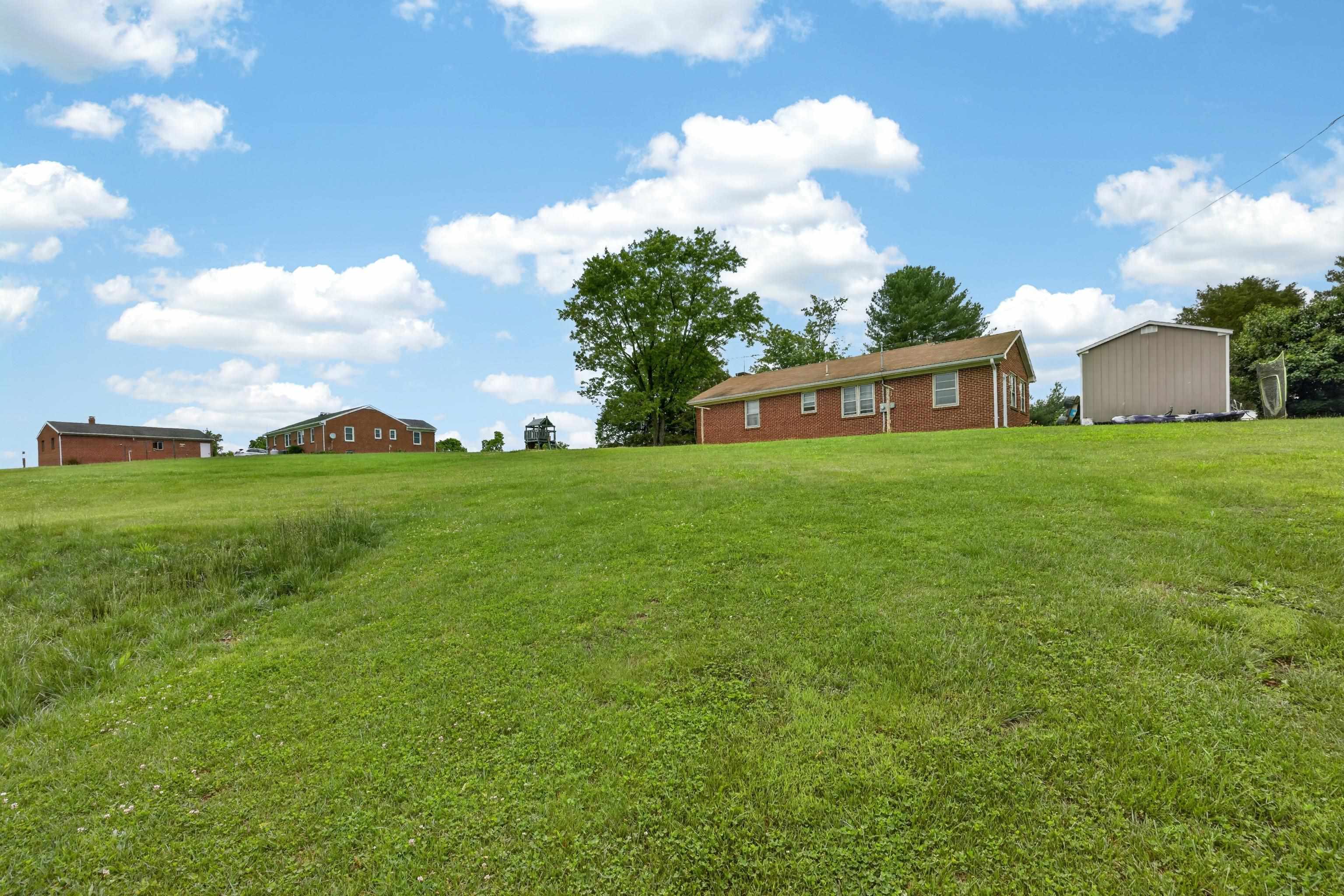 7827 Lee Highway Raphine, VA 24472 - Photo 42 of 62 a view of a house with a big yard