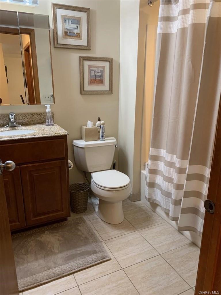 135 West Nyack Road, Unit 51 Nanuet, NY 10954 - Photo 12 of 16 Pretty updated bathroom with a walk in shower stall.