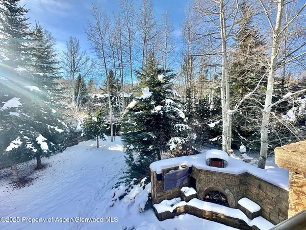 a view of backyard with outdoor seating