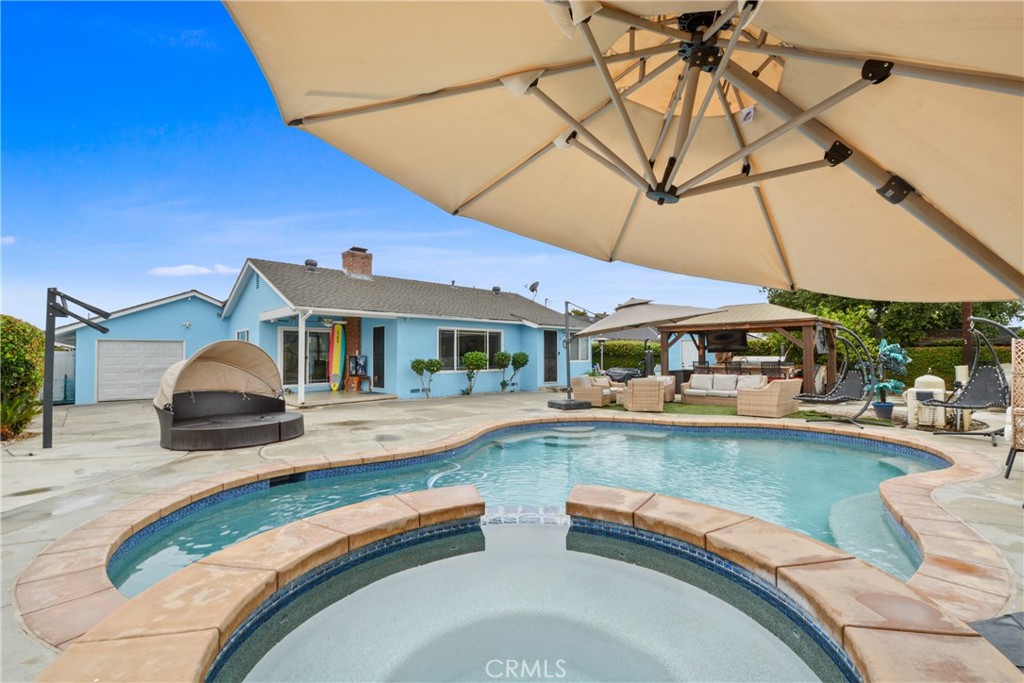 627 West Front Street Covina, CA 91722 - Photo 15 of 16 a swimming pool with outdoor seating and yard