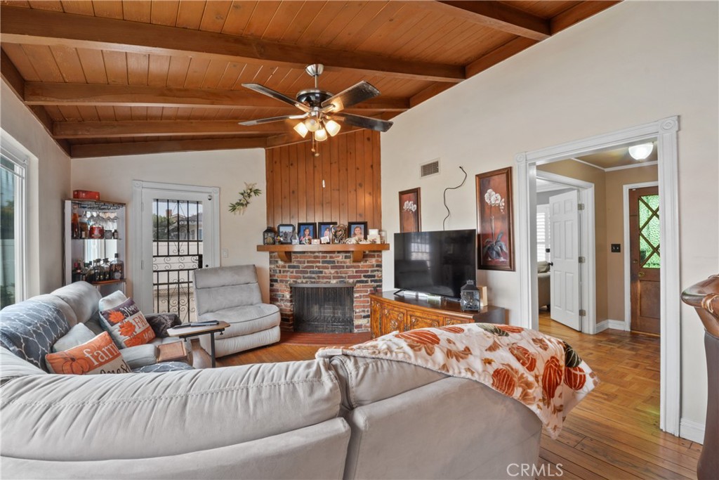 627 West Front Street Covina, CA 91722 - Photo 4 of 16 a living room with furniture and a fireplace