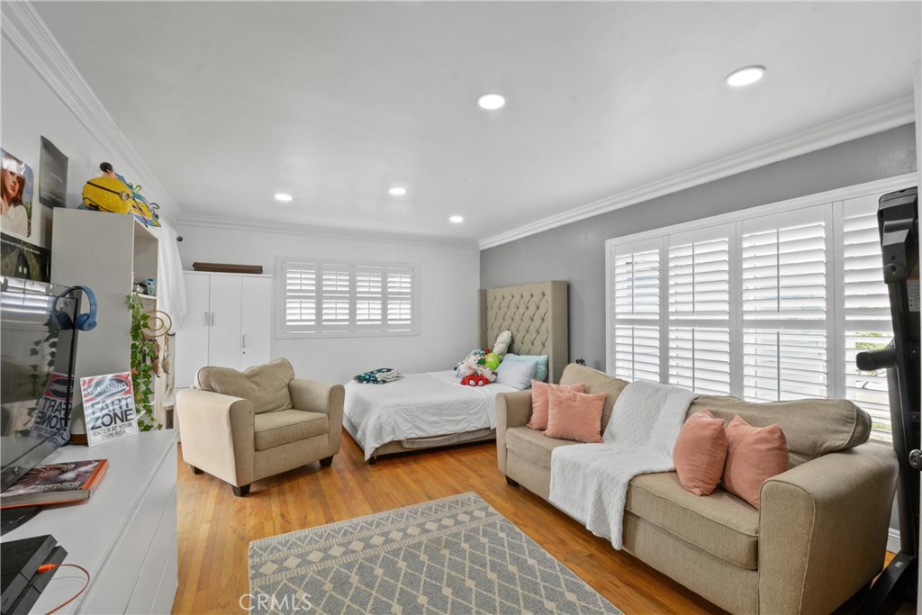 627 West Front Street Covina, CA 91722 - Photo 6 of 16 a living room with furniture and a flat screen tv