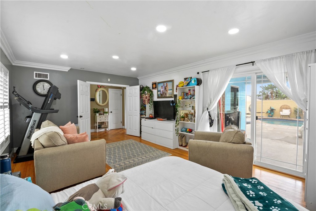 627 West Front Street Covina, CA 91722 - Photo 7 of 16 a living room with furniture and a flat screen tv