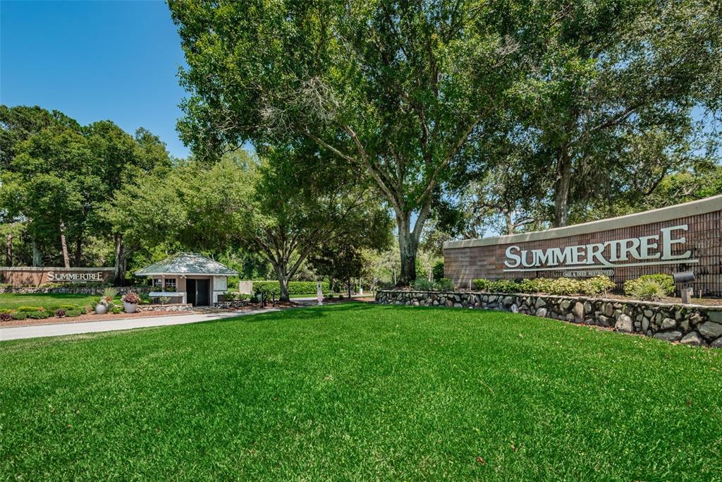 11427 Turtle Dove Place New Port Richey, FL 34654 - Photo 56 of 100 a view of a house with a yard porch and sitting area