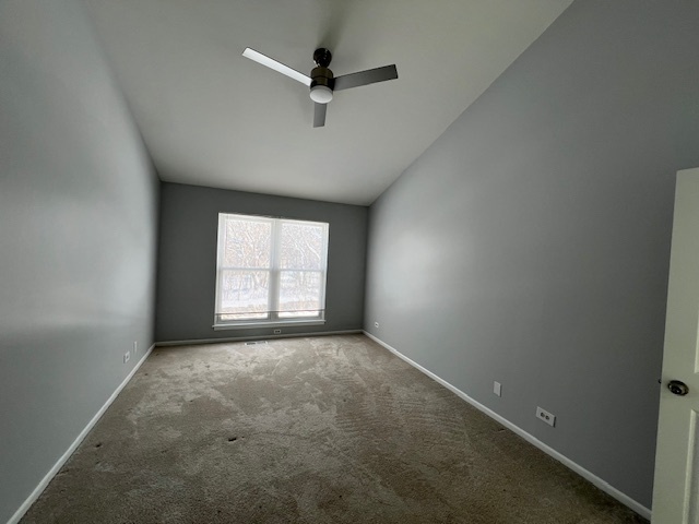 267 Cobblestone Court, Unit 267 Schaumburg, IL 60173 - Photo 14 of 19 an empty room with a window and a fan