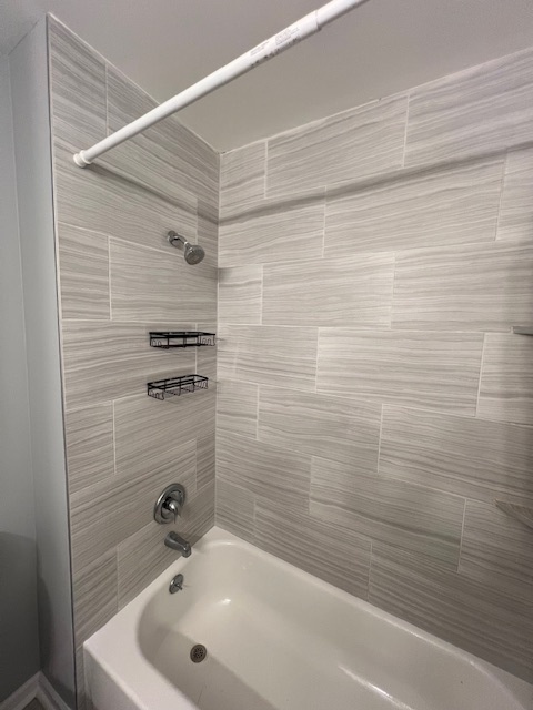 267 Cobblestone Court, Unit 267 Schaumburg, IL 60173 - Photo 15 of 19 a bathroom with a sink and a shower